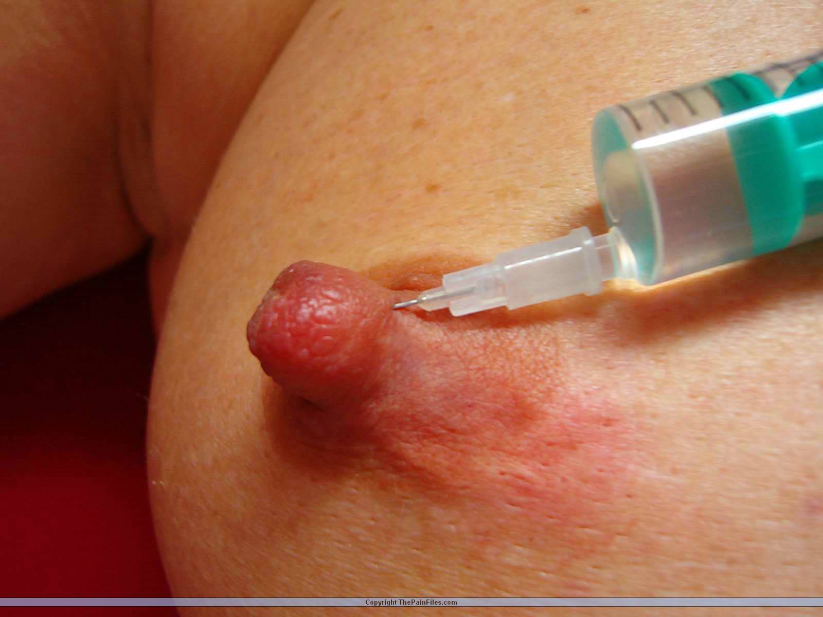 Bdsm girl getting painful saline breast injections